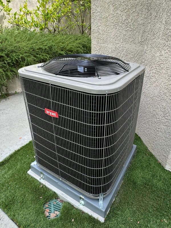 New Bryant air conditioning unit after replacement